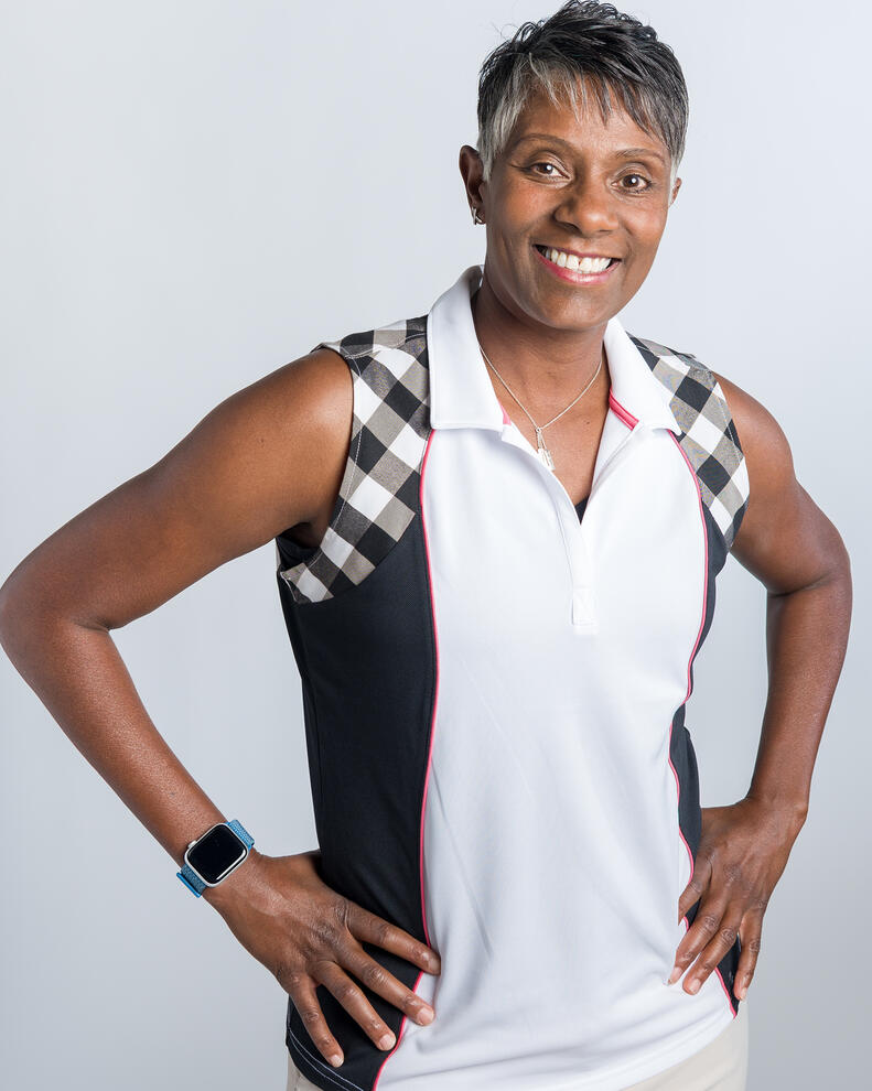Personal branding portrait smiling black athletic woman hands on hips by Tampa Sidney Oster Photography
