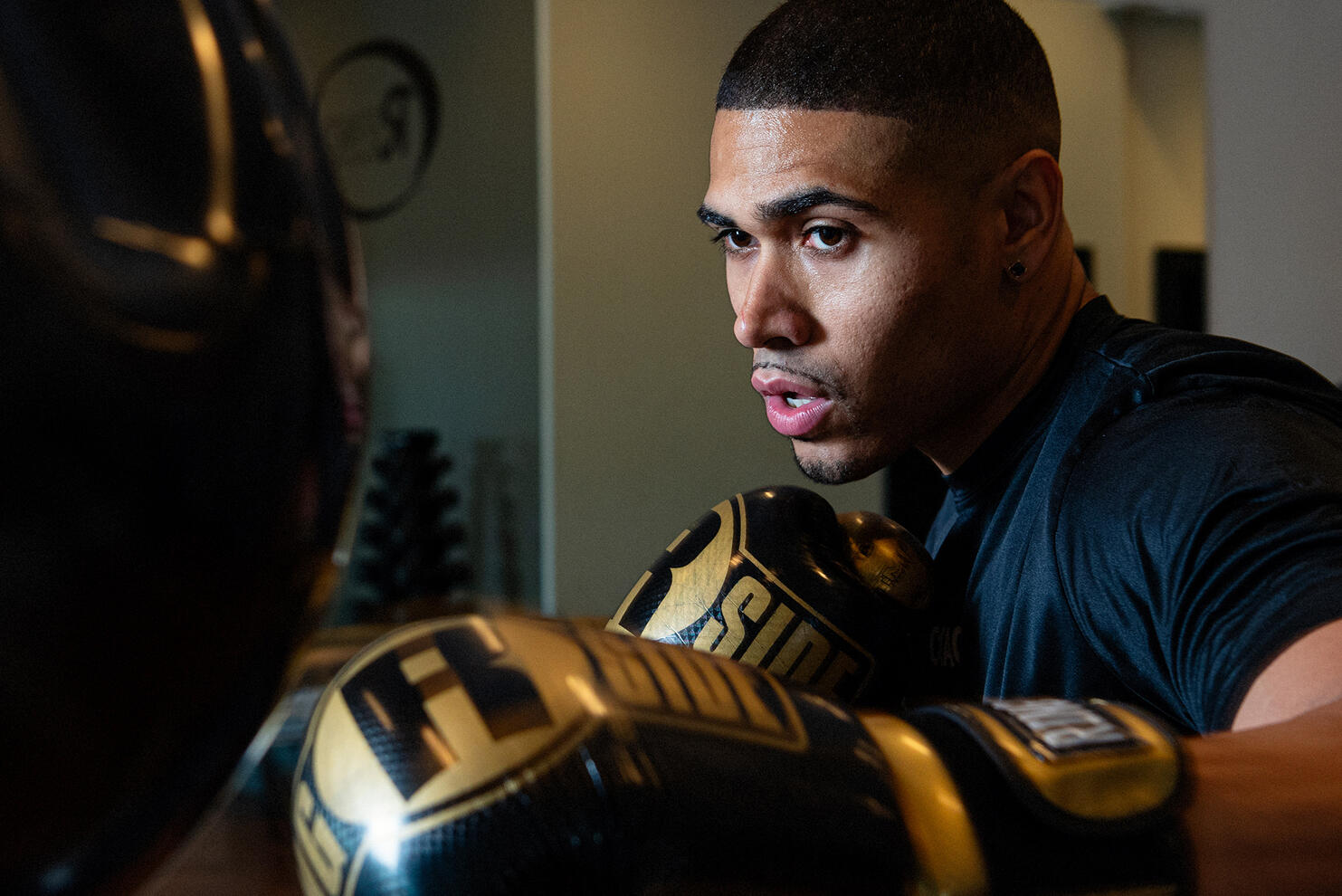 Personal branding portrait young black male boxer by Tampa photographer Sidney Oster