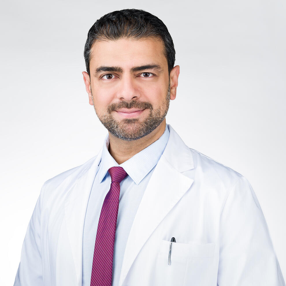 Professional physician headshot in white coat Tampa - medical doctor portrait by Sidney Oster