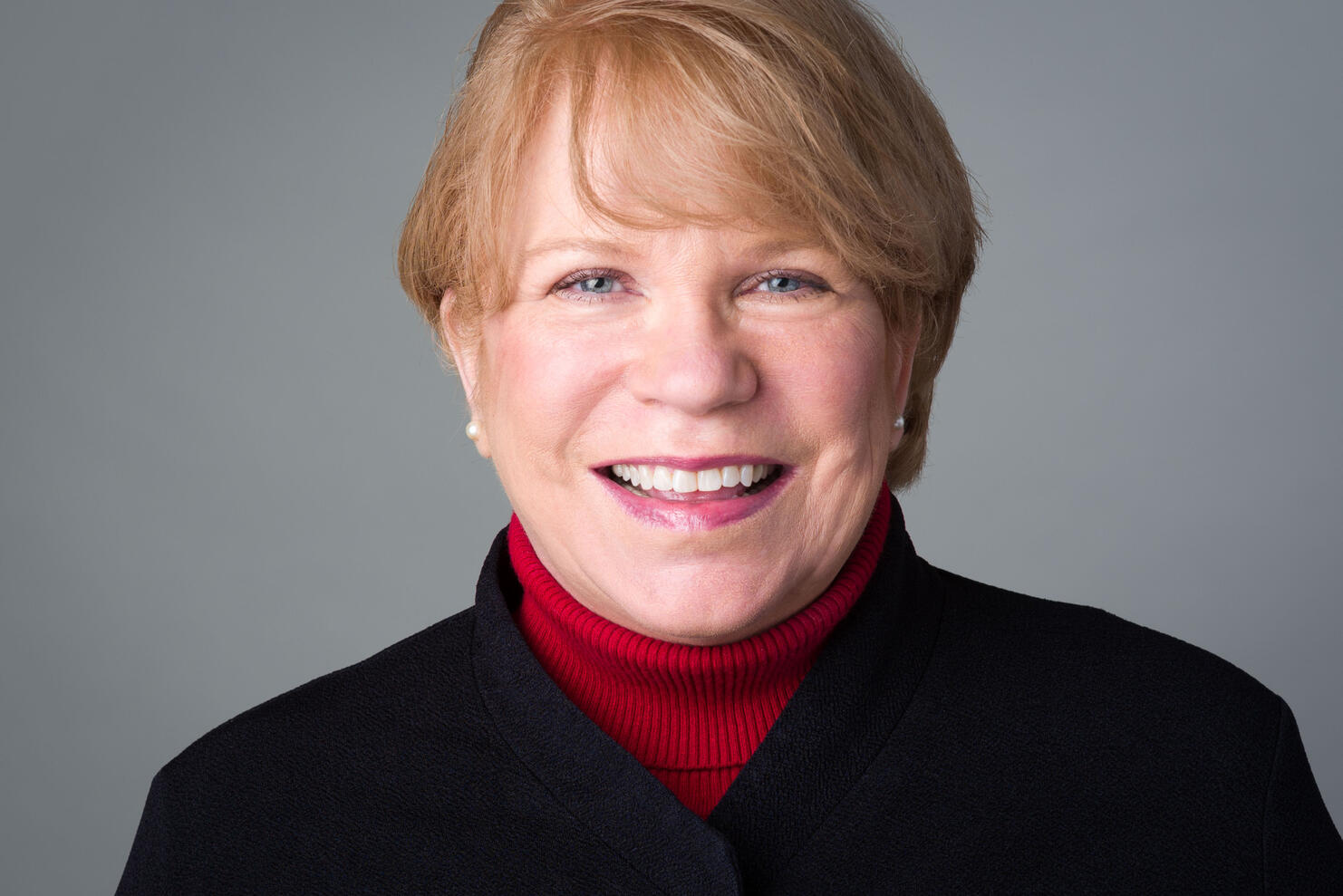 Professional headshot of mature woman executive Tampa photographer Sidney Oster