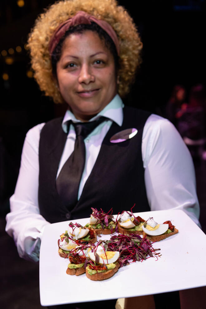Server at a donor event party showing hors d'oeuvres at The Smith Center
