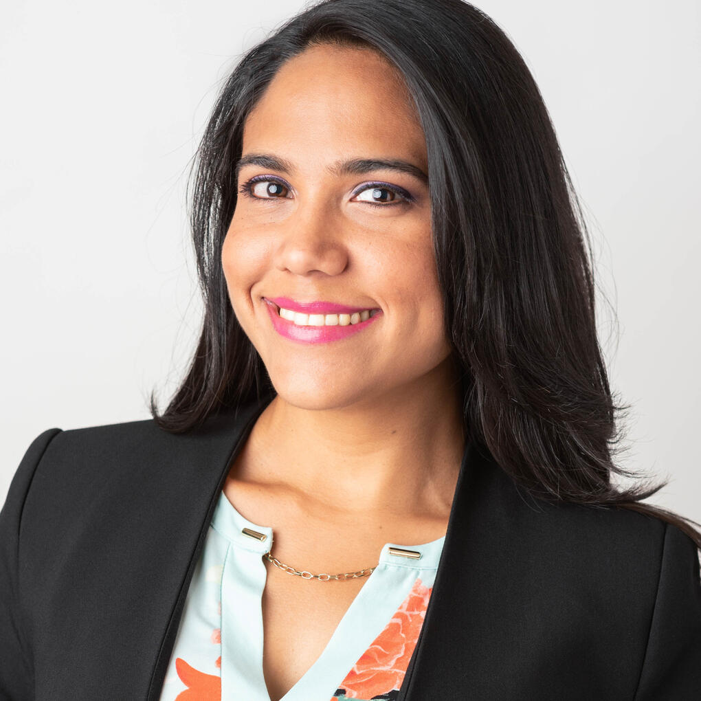 Smiling attractive Hispanic business woman