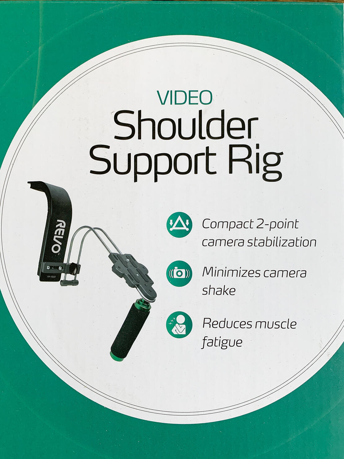 Behind the Scenes ( BTS) at the Slide Insurance corporate holiday party Portrait of Sidney Oster holding a camera and the Tampa Bay Buccaneers flag on the field at Raymond James Stadium. In partnership with SpotMyPhotos.
