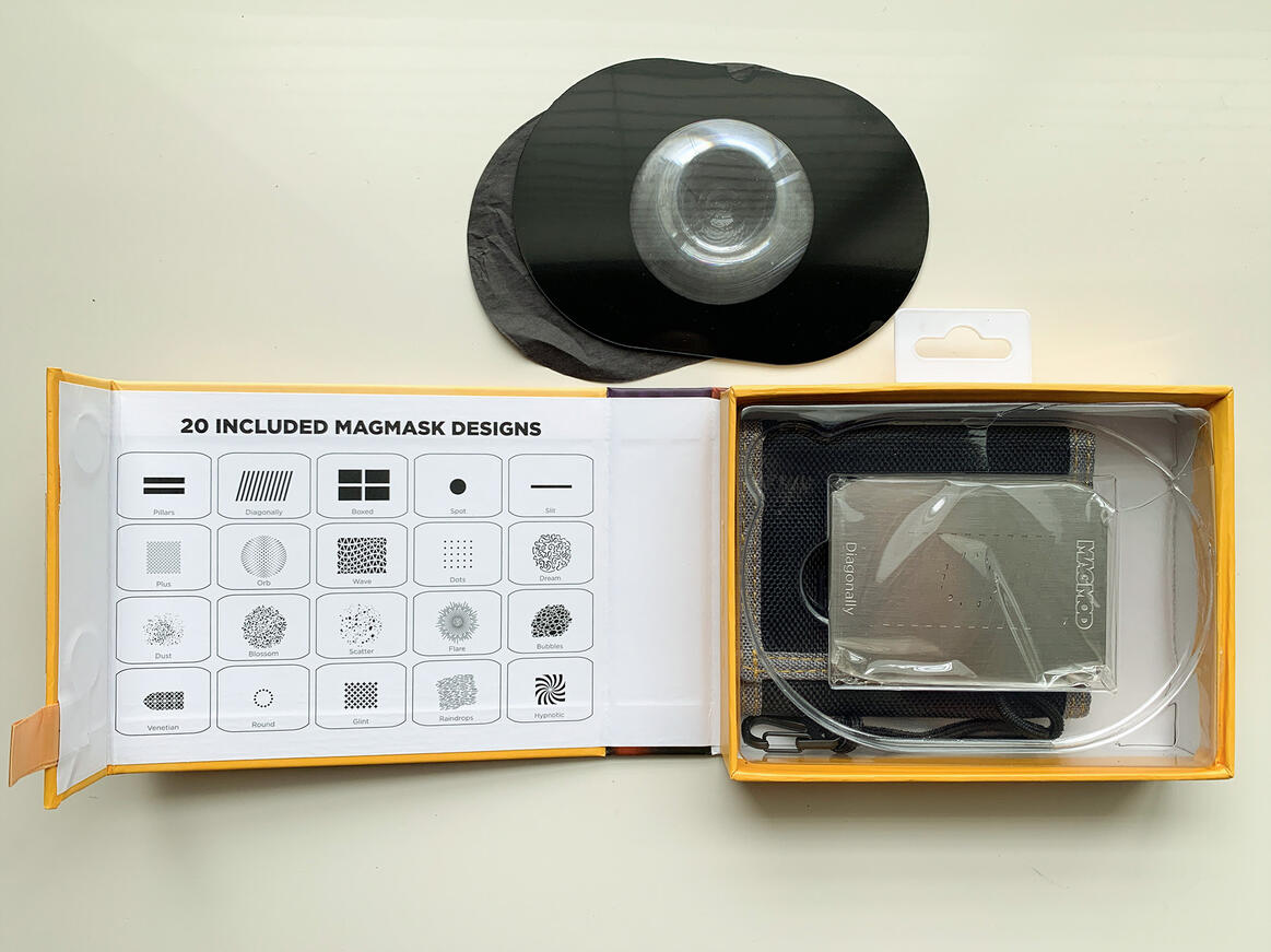 Behind the Scenes ( BTS) at the Slide Insurance corporate holiday party Portrait of Sidney Oster holding a camera and the Tampa Bay Buccaneers flag on the field at Raymond James Stadium. In partnership with SpotMyPhotos.